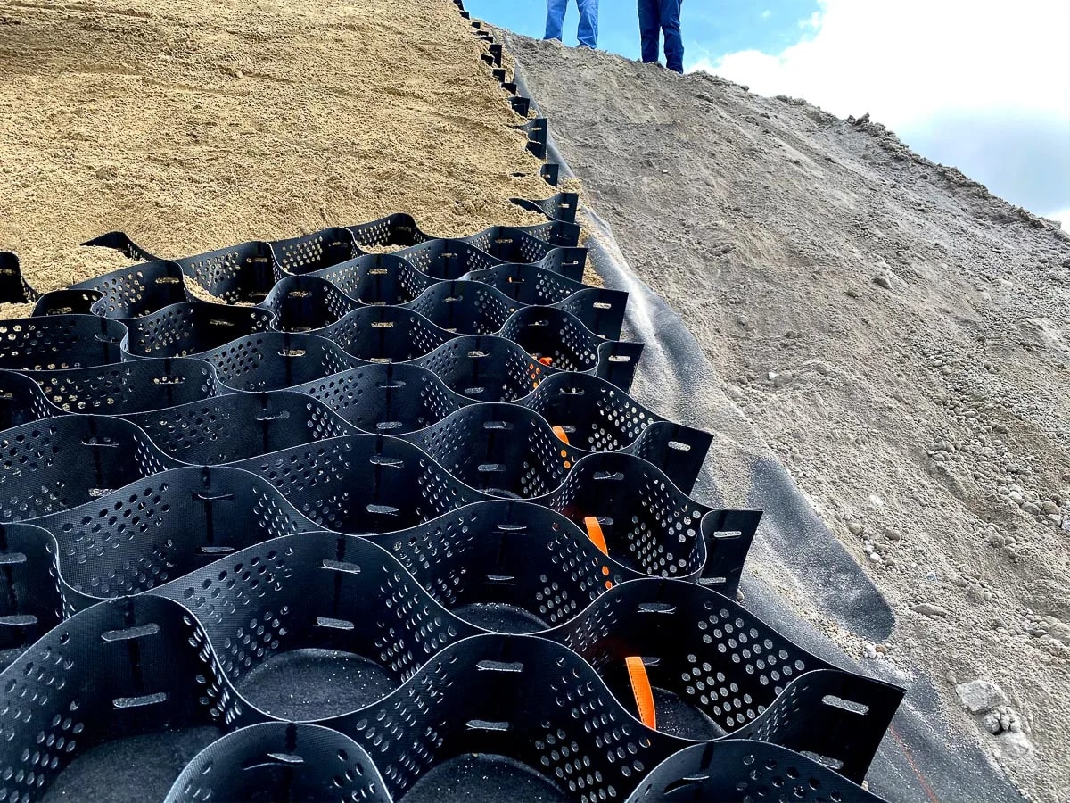 Geocell panel expanded for slope stabilisation, before infill